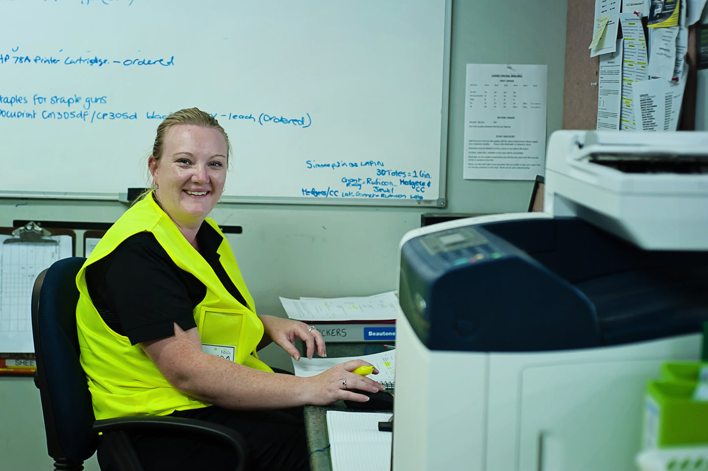 Koala Cherries employee working on the computer in the office
