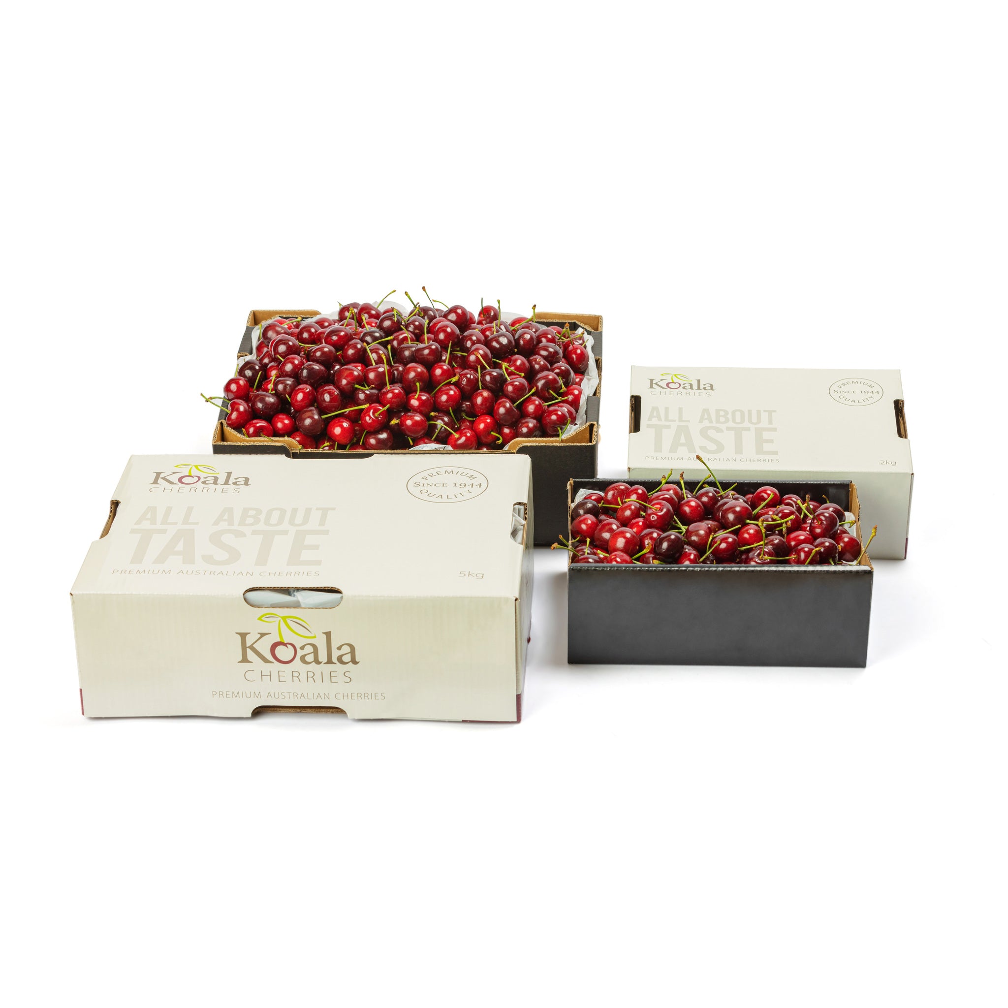 2kg and 5kg box of cherries with the lid off dark red big cherries from koala cherries